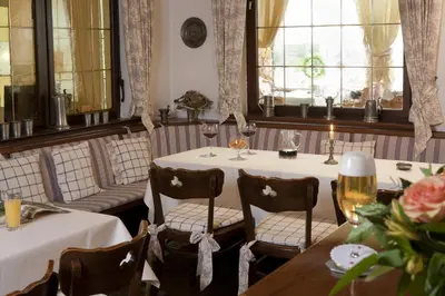 Ein Sitzbereich in der Unterkunft Hotel Parkfrieden