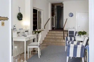 Ein Sitzbereich in der Unterkunft Hotel Parkfrieden