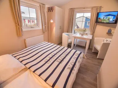 Ein Bett oder Betten in einem Zimmer der Unterkunft Welle 39a