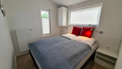 Ein Bett oder Betten in einem Zimmer der Unterkunft Meer 43