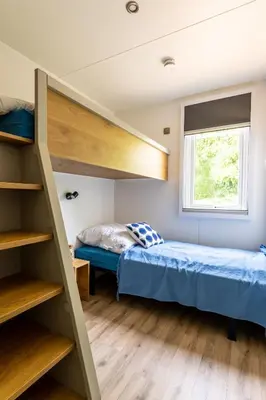 Ein Bett oder Betten in einem Zimmer der Unterkunft Muschel 51