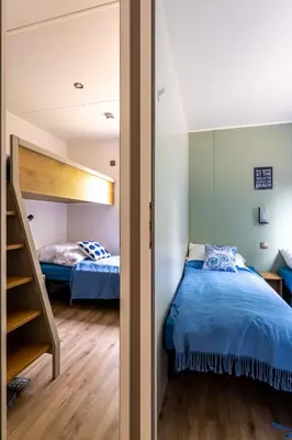 Ein Bett oder Betten in einem Zimmer der Unterkunft Muschel 53