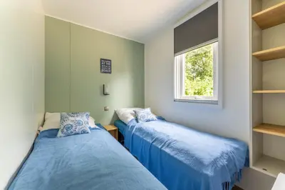 Ein Bett oder Betten in einem Zimmer der Unterkunft Muschel 54