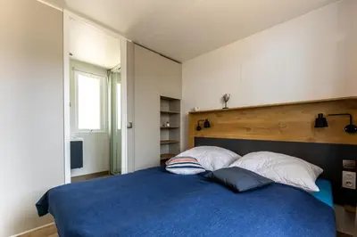 Ein Bett oder Betten in einem Zimmer der Unterkunft Muschel 59