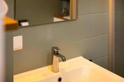 Ein Badezimmer in der Unterkunft DKK1c Ferienwohnung Mole 1