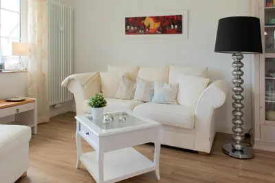 Ein Sitzbereich in der Unterkunft Ferienwohnung Boje 3