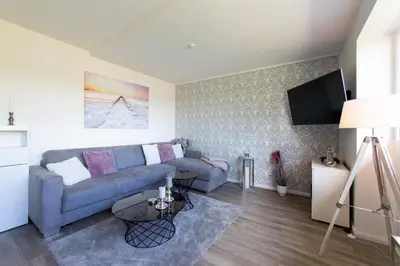Ein Sitzbereich in der Unterkunft Ferienwohnung Sonnentanz
