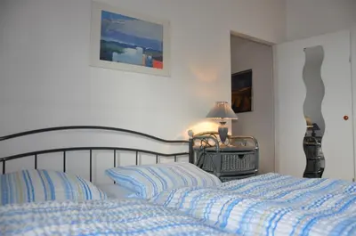 Ein Bett oder Betten in einem Zimmer der Unterkunft Ferienwohnungen Abraham