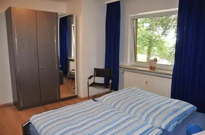 Ein Bett oder Betten in einem Zimmer der Unterkunft Ferienwohnungen Abraham