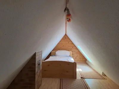 Ein Bett oder Betten in einem Zimmer der Unterkunft Ferienwohnung Haus Lüdtke