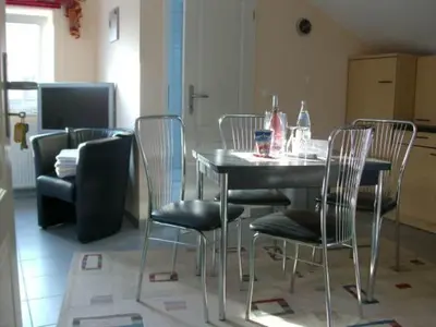 Ein Sitzbereich in der Unterkunft Gästehaus Strandkonsulat