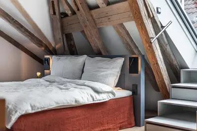 Ein Bett oder Betten in einem Zimmer der Unterkunft Hotel Die Reederin