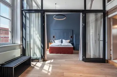 Ein Bett oder Betten in einem Zimmer der Unterkunft Hotel Die Reederin