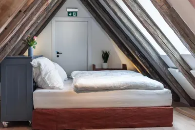 Ein Bett oder Betten in einem Zimmer der Unterkunft Hotel Die Reederin
