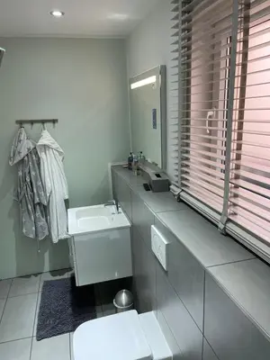 Ein Badezimmer in der Unterkunft Ferienwohnung am Traveufer