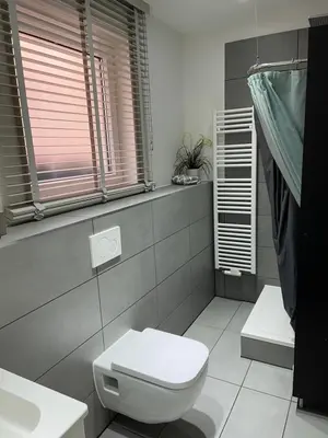 Ein Badezimmer in der Unterkunft Ferienwohnung am Traveufer
