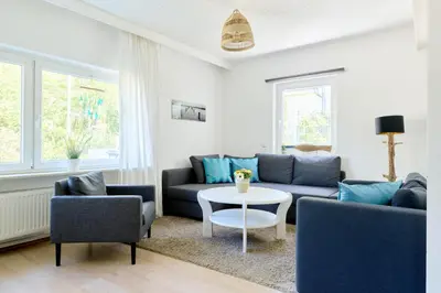 Ein Sitzbereich in der Unterkunft Ferienwohnung Strand Bucht Moba-Travel