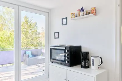 Kaffee-/Teezubehör in der Unterkunft Ferienwohnung Trave Ufer Moba-Travel