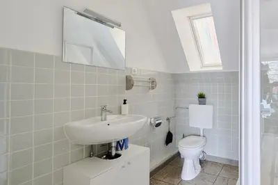 Ein Badezimmer in der Unterkunft Ferienwohnung Trave Ufer Moba-Travel