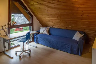 Ein Sitzbereich in der Unterkunft Ferienhaus im Bestetal