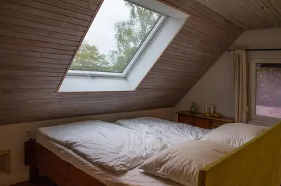 Ein Bett oder Betten in einem Zimmer der Unterkunft Ferienhaus im Bestetal