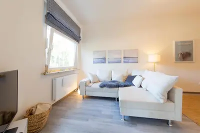 Ein Sitzbereich in der Unterkunft Ferienwohnung Godewind