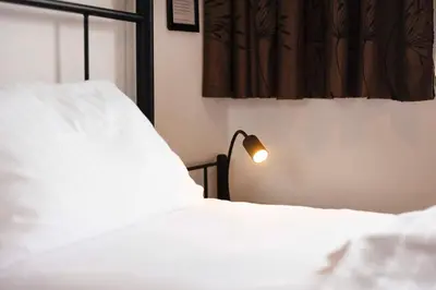 Ein Bett oder Betten in einem Zimmer der Unterkunft (DKK11B) Ferienwohnung Seegras
