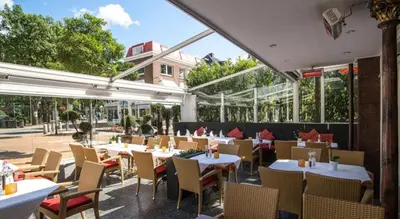 Ein Restaurant oder anderes Speiselokal in der Unterkunft Hotel Holsteiner Hof - Timmendorfer Strand
