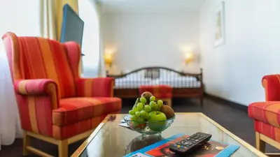 Ein Sitzbereich in der Unterkunft Hotel Holsteiner Hof - Timmendorfer Strand