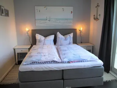 Ein Bett oder Betten in einem Zimmer der Unterkunft Ferienhaus Oceanview