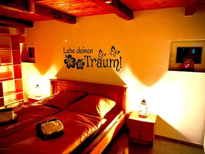 Ein Bett oder Betten in einem Zimmer der Unterkunft Seaside‘s Villa Kunterbunt
