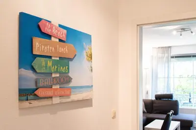 Ein Sitzbereich in der Unterkunft Ferienwohnung Sailor's Cabin