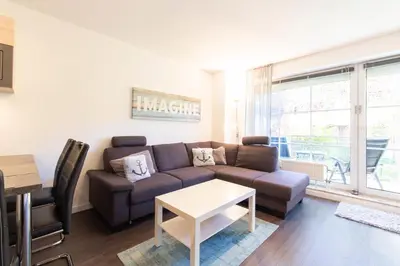 Ein Sitzbereich in der Unterkunft Ferienwohnung Sailor's Cabin