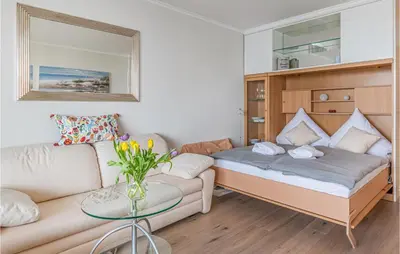 Ein Bett oder Betten in einem Zimmer der Unterkunft Cozy Apartment In Timmendorfer Strand