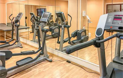 Das Fitnesscenter und/oder die Fitnesseinrichtungen in der Unterkunft Cozy Apartment In Timmendorfer Strand
