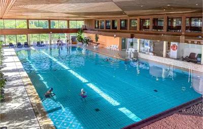 Der Swimmingpool an oder in der Nähe von Cozy Apartment In Timmendorfer Strand