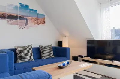 TV/Unterhaltungsangebot in der Unterkunft Ferienwohnung Ostseeherz Scharbeutz