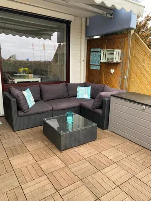 Ein Sitzbereich in der Unterkunft Stylische Ferienwohnung Scharbeutz TOP LAGE Strand
