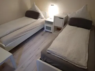Ein Bett oder Betten in einem Zimmer der Unterkunft Monteurzimmer Lützow