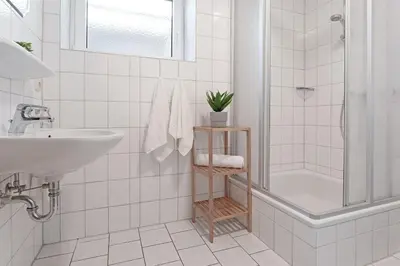 Ein Badezimmer in der Unterkunft Fahrenkrug Oststurm