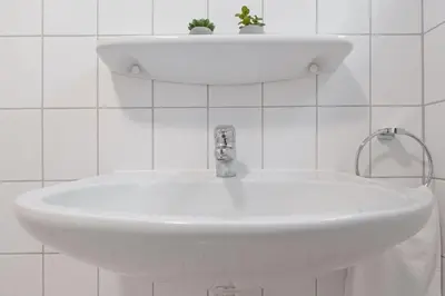 Ein Badezimmer in der Unterkunft Fahrenkrug Oststurm