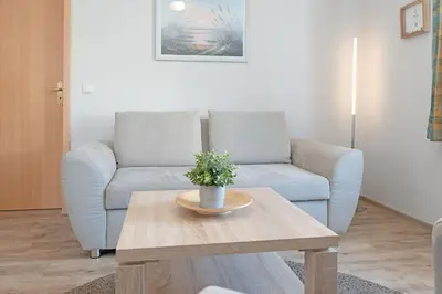 Ein Sitzbereich in der Unterkunft Fahrenkrug Nordlicht