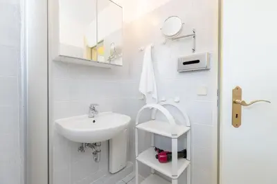 Ein Badezimmer in der Unterkunft Haus am Kurpark Scharbeutz Wohnung 5