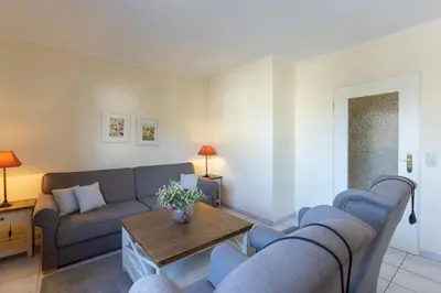 Ein Sitzbereich in der Unterkunft Haus am Kurpark Scharbeutz Wohnung 5