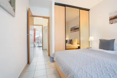 Ein Bett oder Betten in einem Zimmer der Unterkunft Gorch-Fock Park 2