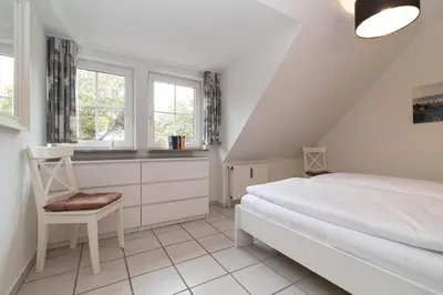 Ein Bett oder Betten in einem Zimmer der Unterkunft Gorch-Fock Park 9