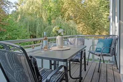 Ein Balkon oder eine Terrasse in der Unterkunft Strandvilla Augustusbad Unter'm Ostseestern