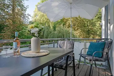 Ein Balkon oder eine Terrasse in der Unterkunft Strandvilla Augustusbad Unter'm Ostseestern