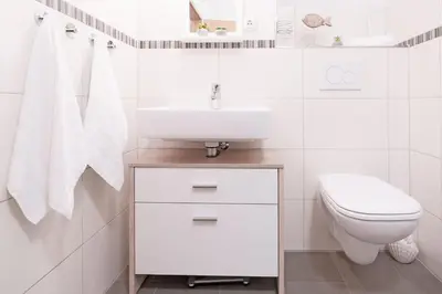 Ein Badezimmer in der Unterkunft Strandvilla Augustusbad Unter'm Ostseestern