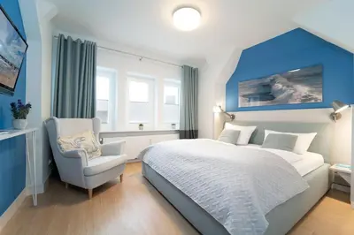 Ein Bett oder Betten in einem Zimmer der Unterkunft Tanneneck Storchennest